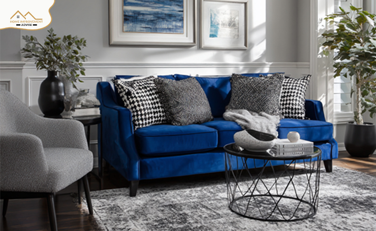 Blue Couch with Grey Walls and Furniture: Calm and Sophisticated